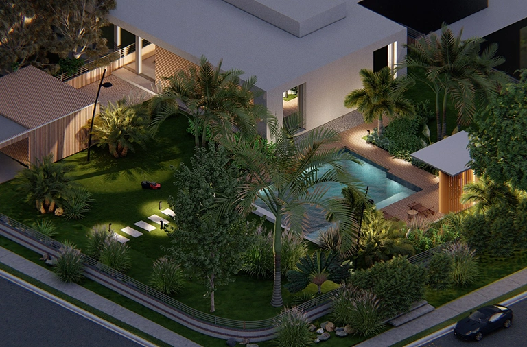 Vista aérea de espacio exterior residencial con piscina y jardín tropical iluminado