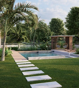 Piscina residencial con jardín tropical